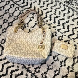 Vintage Michael Kors cream and tan purse and wallet.